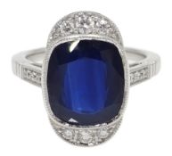 18ct white gold cushion cut sapphire and diamond cluster ring,