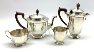 Silver circular four piece tea set, of panel sided design, Birmingham 1928, makers Mappin & Webb 55.