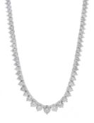 18ct white gold graduating diamond necklace stamped 18K, total diamond weight 13.