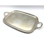 Silver rectangular two handled tray with gadrooned edge and floral handles 57cm x 34cm overall,