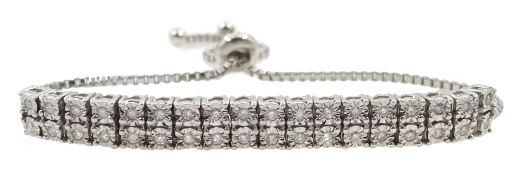 Platinum on silver double row diamond bracelet, with adjustable bolo slider,