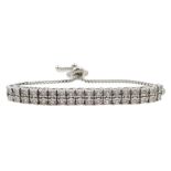 Platinum on silver double row diamond bracelet, with adjustable bolo slider,