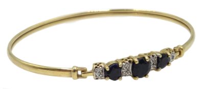 Gold sapphire and diamond bangle stamped 9K Condition Report & Further Details