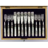 Set of six fish knives and forks with engraved decoration and mother of pearl handles in mahogany