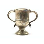 Early George III silver two handled baluster mug with loop handles and pedestal foot H13cm London