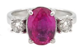 18ct white gold oval pink sapphire and round brilliant cut diamond three stone ring hallmarked,