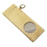 9ct gold and stainless steel rectangular cigar cutter with engine turned decoration and hanging