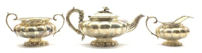 William IV silver teapot and milk jug of lobed circular design,