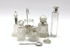Small cut glass globe scent bottle with silver cover,