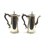Pair of silver Cafe au Lait pots with domed covers,