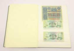 Album containing thirty-six Scottish banknotes and a small number of World banknotes including The