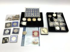 Two silver proof five pound coins, nine base metal five pound coins each sealed in a plastic packet,