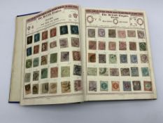 'The Empire Postage Stamp Album' containing Queen Victoria and later Great British and World stamps