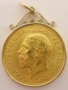 King George V 1929 gold full sovereign, Pretoria mint, in 9ct gold mount,