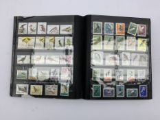 Stock book and contents of Bird themed stamps Condition Report & Further Details