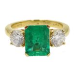 18ct gold emerald and round brilliant cut diamond three stone ring hallmarked, emerald 2.