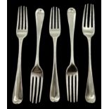 Five George III silver forks Old English pattern and Griffin Crest, hallmarked 1804 & 1813,