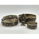 19th Century Tibetan silver 5 piece mandala set embossed with elephants etc