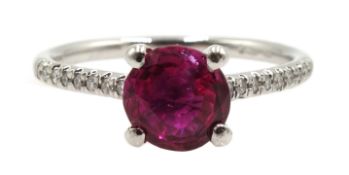 Platinum hot pink round sapphire ring with diamond set shoulders, hallmarked, sapphire approx 1.