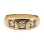 Gold three stone diamond gypsy ring,