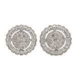 Pair of 18ct white gold diamond target stud earrings, stamped 750, total diamond weight 1.