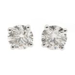 Pair of 18ct white gold round brilliant cut diamond stud earrings, stamped 750,