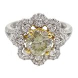 18ct white gold diaond flower cluster ring, the central fancy brilliant cut diamond approx 1.