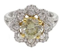 18ct white gold diaond flower cluster ring, the central fancy brilliant cut diamond approx 1.