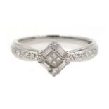 18ct white gold baguette and round brilliant cut diamond ring,