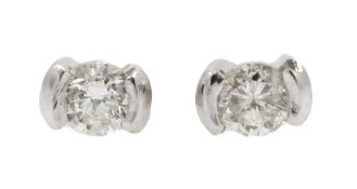 Pair of 18ct white gold single stone diamond screw back stud earring,