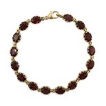 9ct gold oval garnet link bracelet,