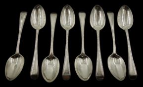 Eight Victorian silver dessert spoons, Old English thread pattern and Griffin Crest by Chawner & Co,
