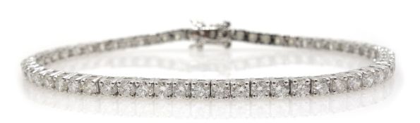 White gold diamond line bracelet, stamped 18K, diamond total weight 5.
