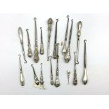 Collection of seventeen various silver handled glove and boot button hooks