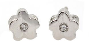 Pair of 18ct white gold diamond flower stud earrings,