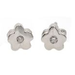 Pair of 18ct white gold diamond flower stud earrings,