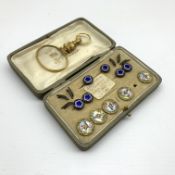 Five 19th Century French silver gilt and enamel buttons marked 'A P & Cie, Paris',
