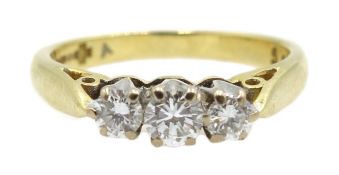 Round brilliant cut three stone diamond ring, Birmingham 2000, diamond total weight 0.