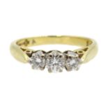 Round brilliant cut three stone diamond ring, Birmingham 2000, diamond total weight 0.