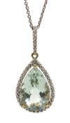 Gold pear shaped green amethyst and diamond pendant stamped 10K,