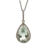 Gold pear shaped green amethyst and diamond pendant stamped 10K,