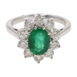 18ct white gold oval emerald and diamond cluster ring, stamped 750, emerald 1.