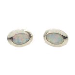 Pair of silver oval opal stud earrings,