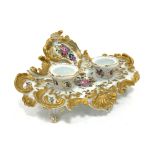 Late 19th Century Continental porcelain inkstand of rococo design decorated with floral sprays