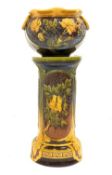 Late Victorian Bretby jardiniere and stand of cylindrical form,