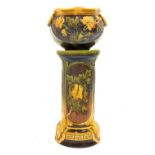 Late Victorian Bretby jardiniere and stand of cylindrical form,