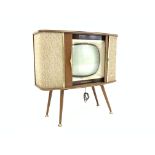 Vintage Sobell model sc270 television set in walnut case with tambour sliding doors,