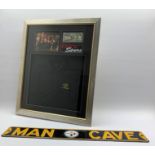 Framed memorabilia from the American TV show 'Pawn Stars' comprising a branded Polo shirt,
