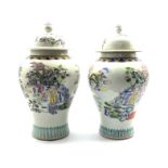 Near pair 20th Century Chinese Baluster vases and covers,