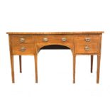 Georgian mahogany kneehole sideboard, one long drawer flanked by one deep drawer and one cupboard,